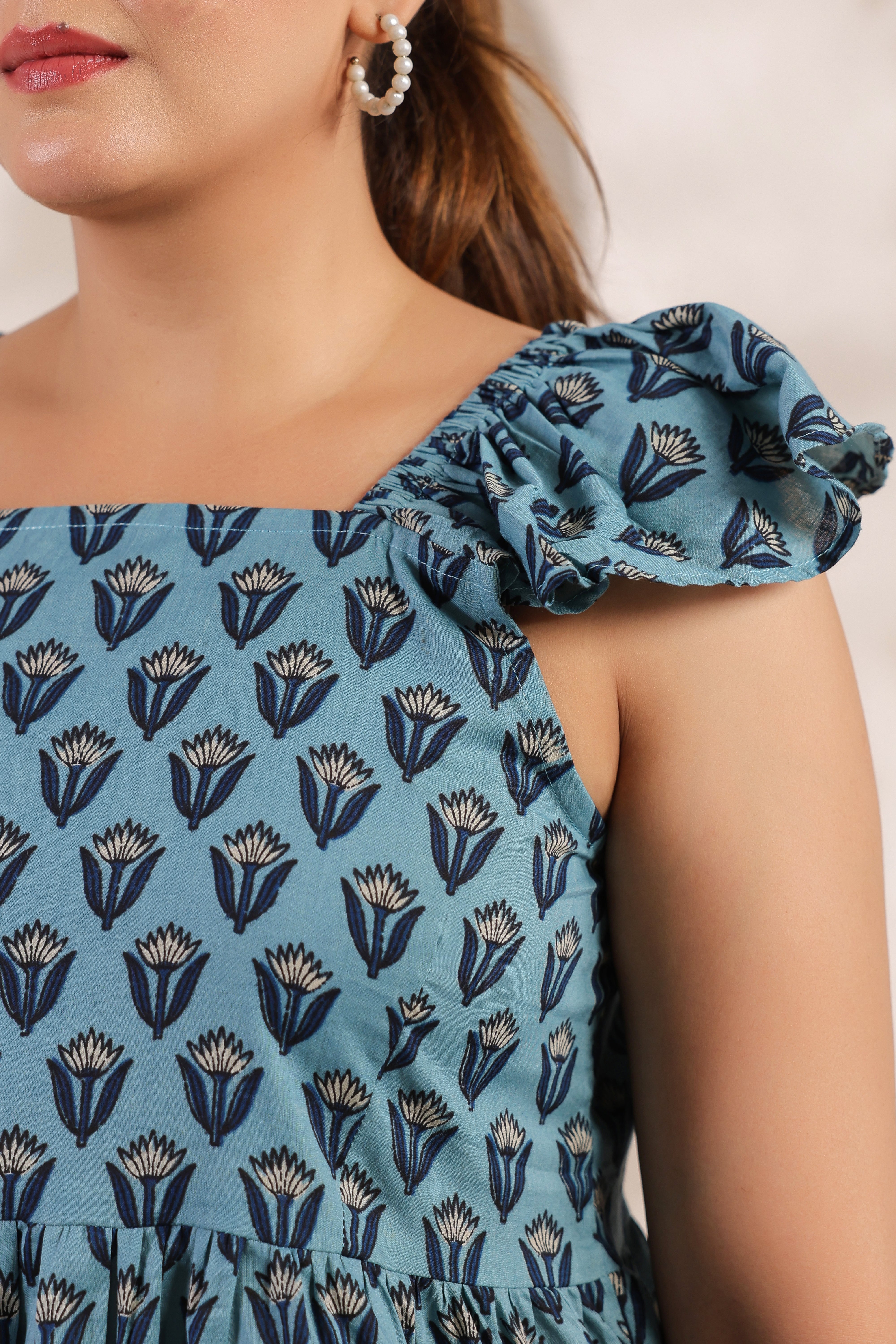 Blue Floral Printed Sleeveless Kurti Top